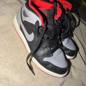 Nike Kids Black and Gray Sneakers with Red Accents